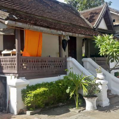 a statue in front of a house
