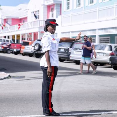 a person riding a skateboard down a street