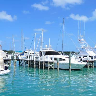 a boat is docked next to a body of water