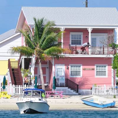 a large pool of water in front of a house