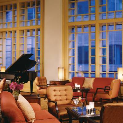 a living room filled with furniture and a large window