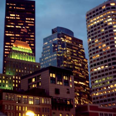 a tall building in a city at night