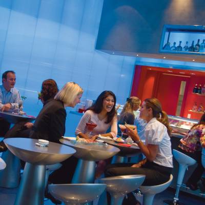 a group of people sitting at a table