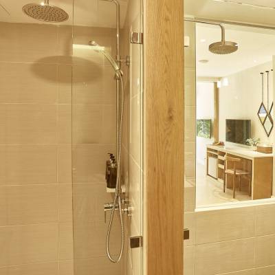 a room with a sink and a mirror