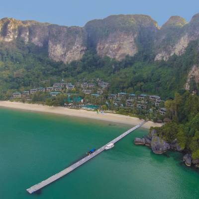 a body of water with Railay Beach in the background