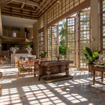 a room filled with furniture and a large window