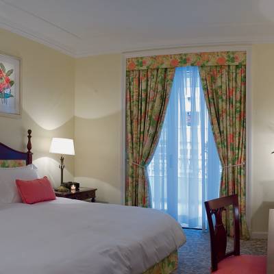 a bedroom with a bed in a hotel room