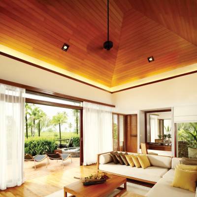 a living room filled with furniture and a large window