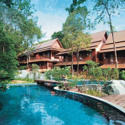 a house with a large pool of water