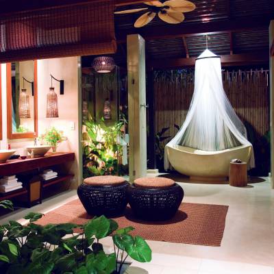 a living room filled with furniture and a fireplace