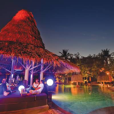 a boat that is lit up at night