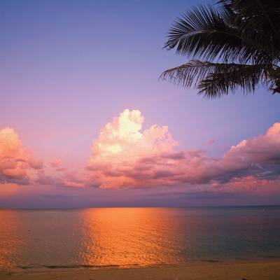 a sunset over a body of water