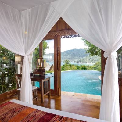 a room filled with furniture and a curtain
