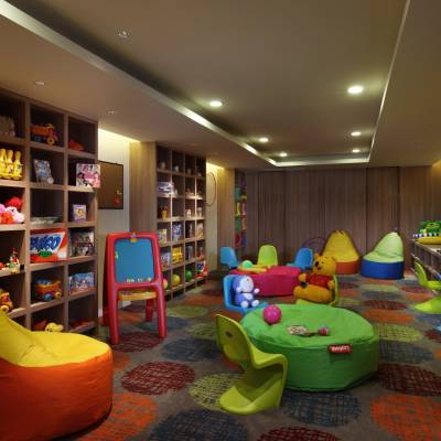 a living room filled with furniture and a flat screen tv