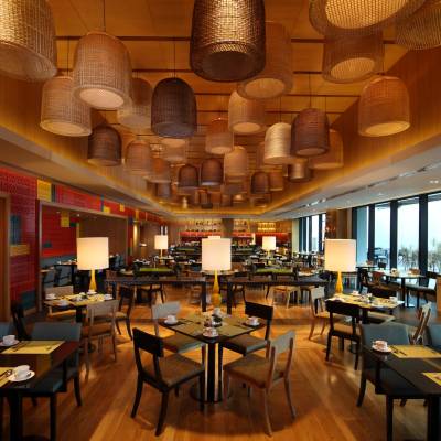 a room filled with furniture and a table in a restaurant
