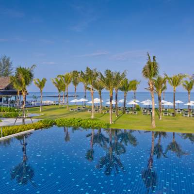 a pool next to a body of water