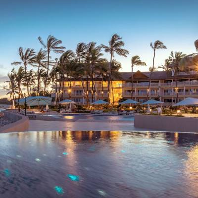 View at Hotel Hemingways Watamu reflected on water at dusk