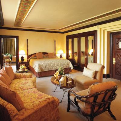a living room filled with furniture and a large window