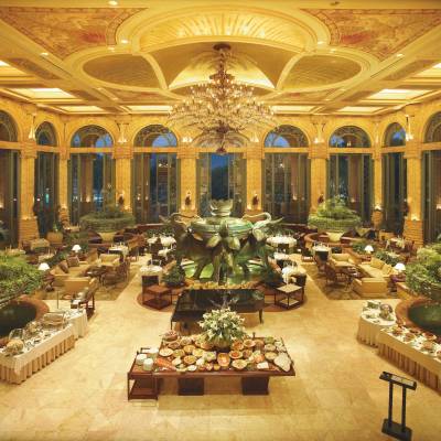 a room filled with furniture and a large building