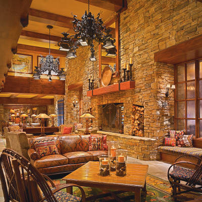 a room filled with furniture and a fireplace