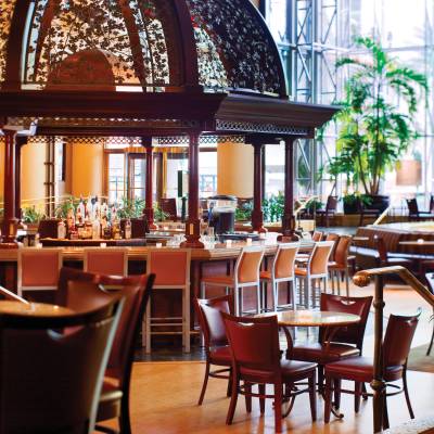 a dining room table in front of a window