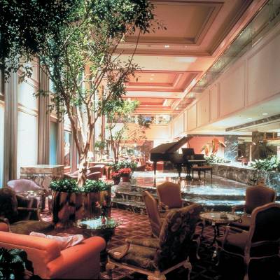 a living room filled with furniture and a fireplace