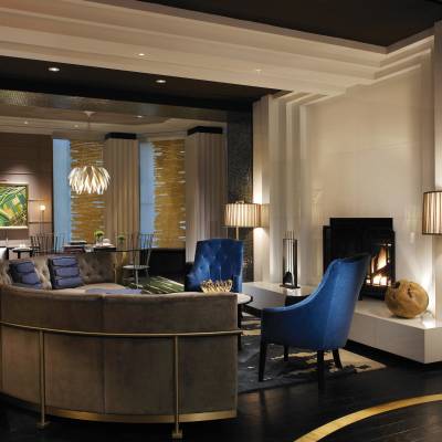 a living room filled with furniture and a large window