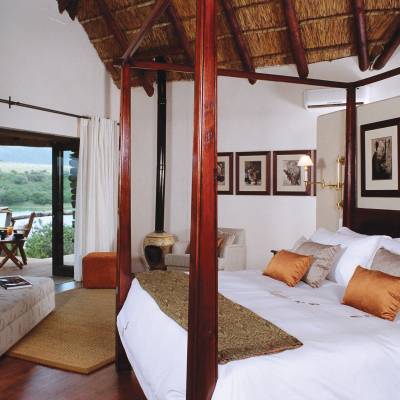 a bedroom with a bed in a hotel room