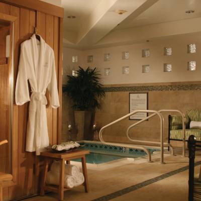 a living room filled with furniture and a fireplace
