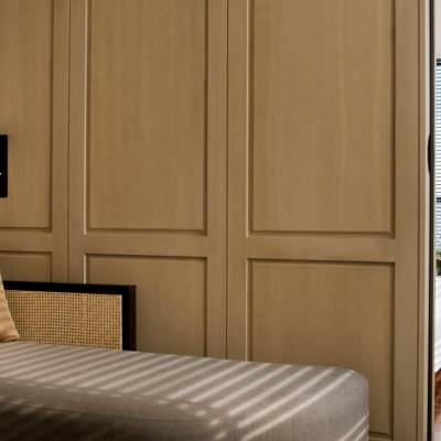 a bedroom with a large bed in a room