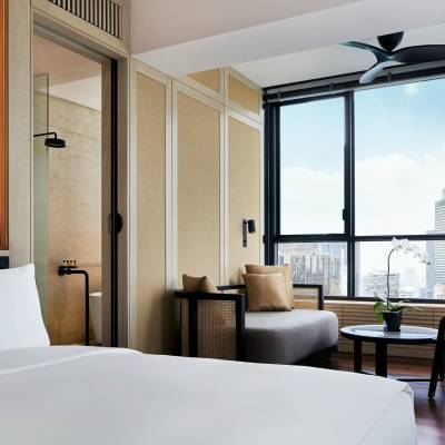 a hotel room with a large window