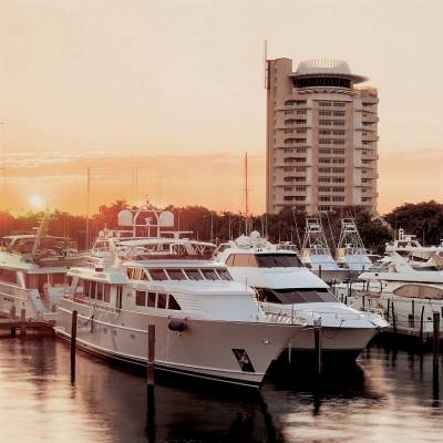 a boat is docked next to a body of water