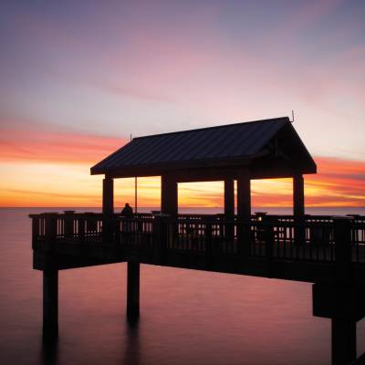 a sunset over a body of water