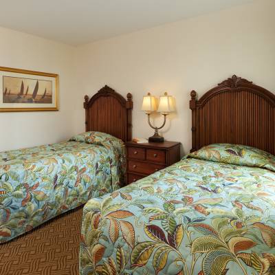 a bedroom with a bed in a room