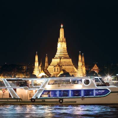 a boat that is lit up at night