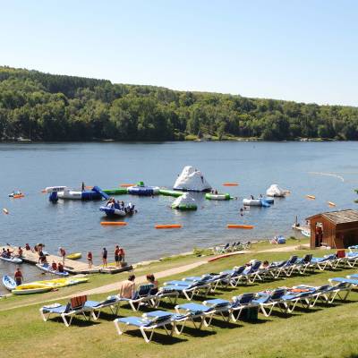 a group of people on a boat in a body of water