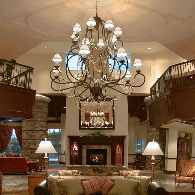 a living room filled with furniture and a fireplace
