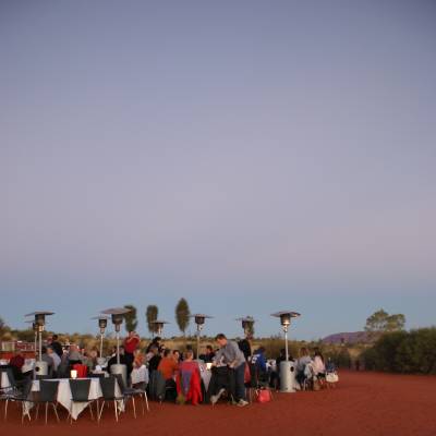 a group of people on a beach