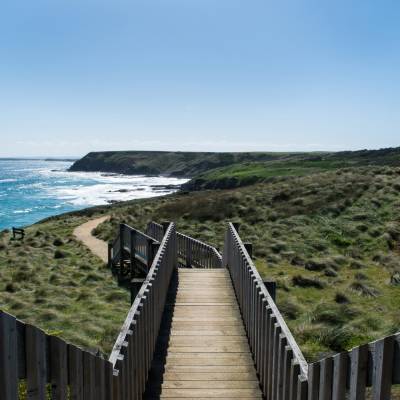 a wooden bridge over a body of water