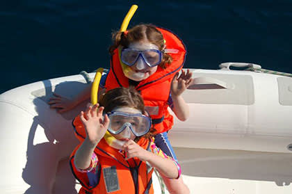 Kinderen in snorkeluitrusting