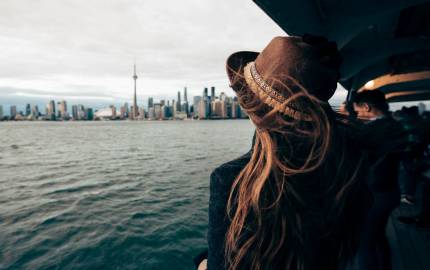 a person wearing a hat and sunglasses