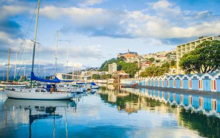 a boat is docked next to a body of water