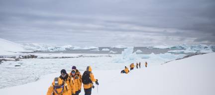 Passengers hiking through Antarctica