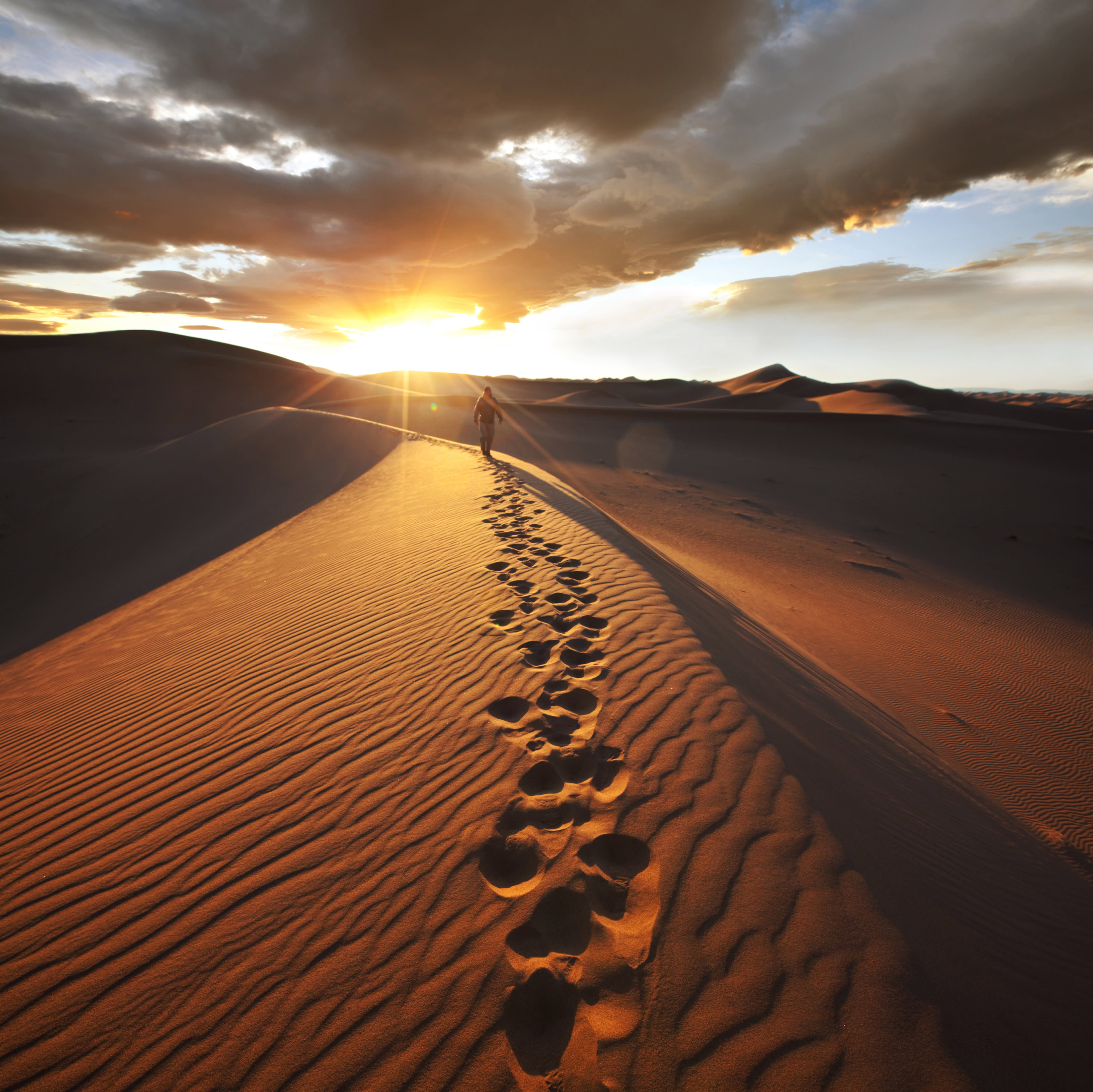 walking on sand dune