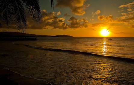 a sunset over a body of water