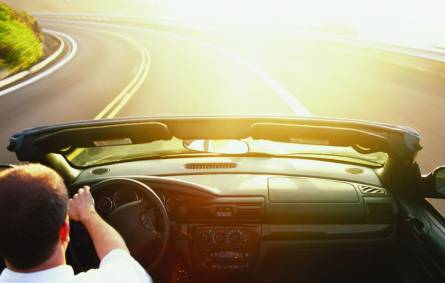 a man driving a car