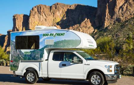a van parked on the side of a mountain