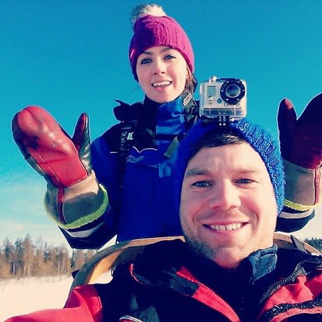 Olivia and her partner in Finland