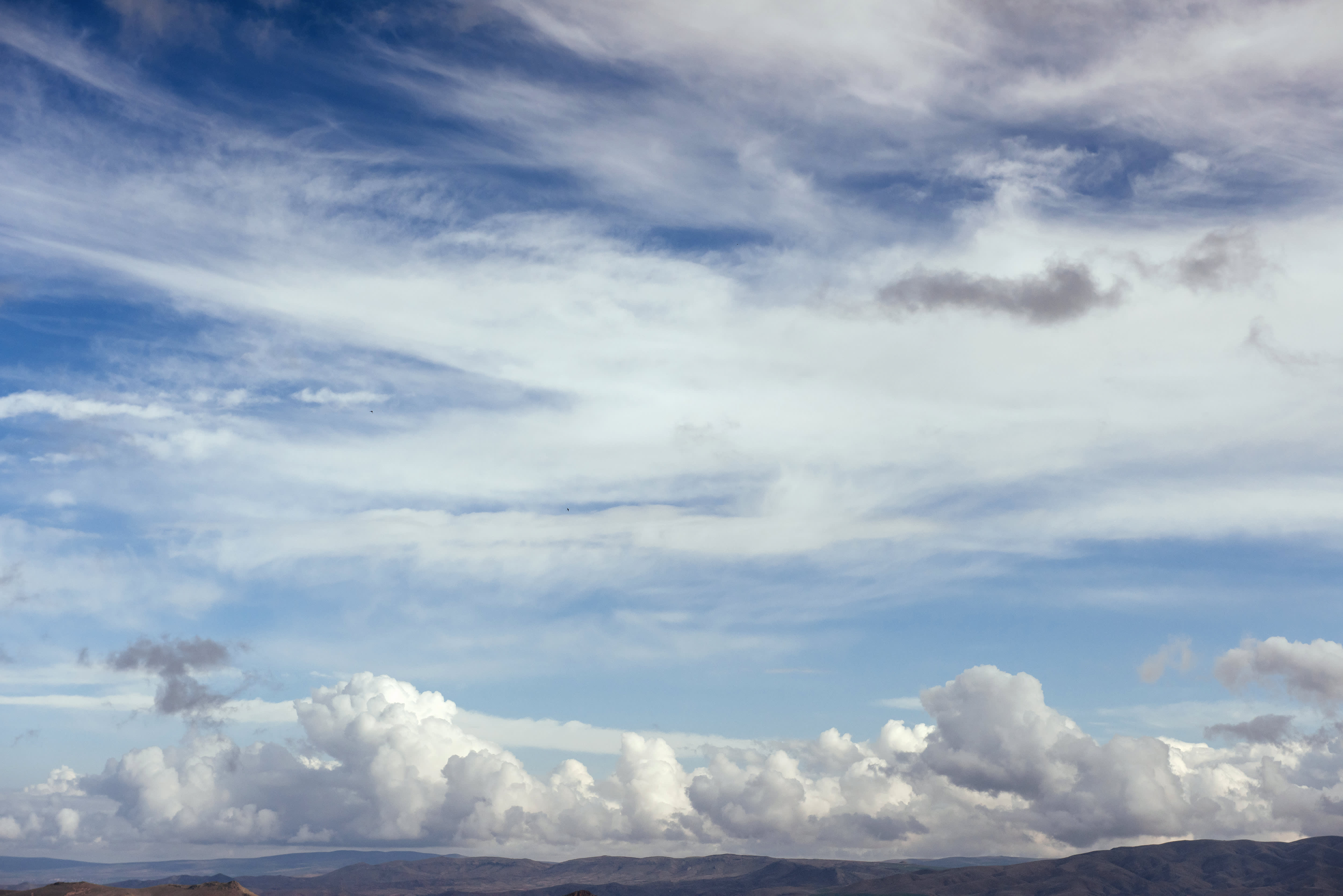 Many cumulonimbus cloud before raining with blue sky