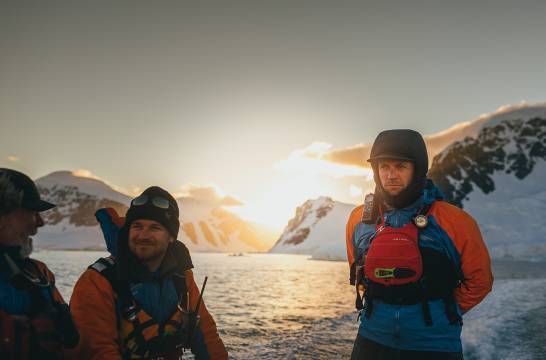 Expedition Guides in Antarctic landscape